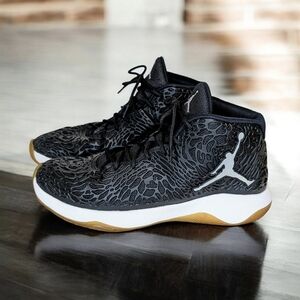 Nike Air Jordans Black Athletic Shoes. Women's 10 or Boys 9.5